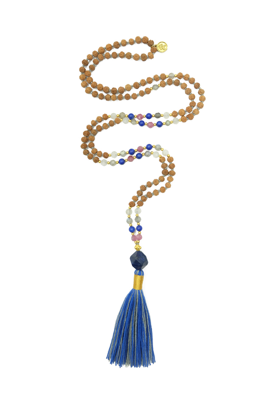 The Blue Moon Mala from balimalas.com is handcrafted with rudrani seeds, moonstone, labradorite and tourmaline gemstone with 22k gold accents.