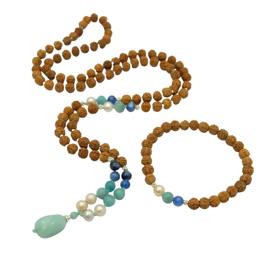 Mala Prayer beads strung with rudraksha, amazonite, pearl , kyanite  and pendant and sterling silver accents.